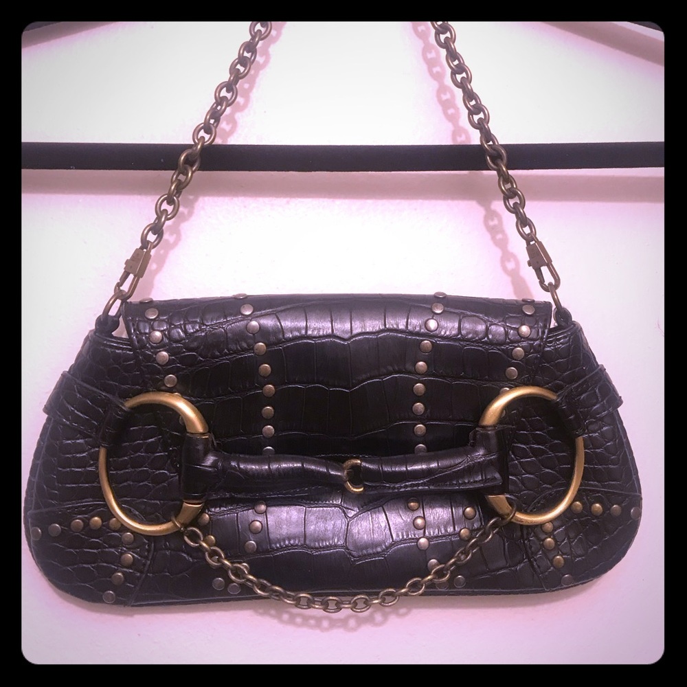 Black purse with gold studs